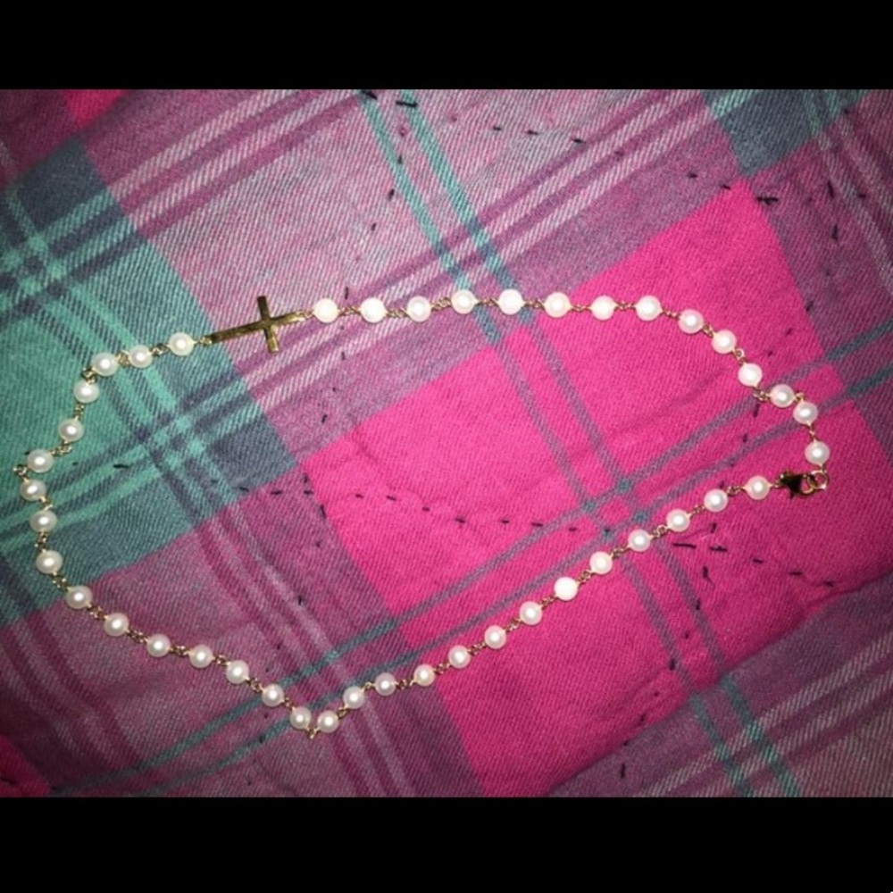 Quan pearl and cross necklace.